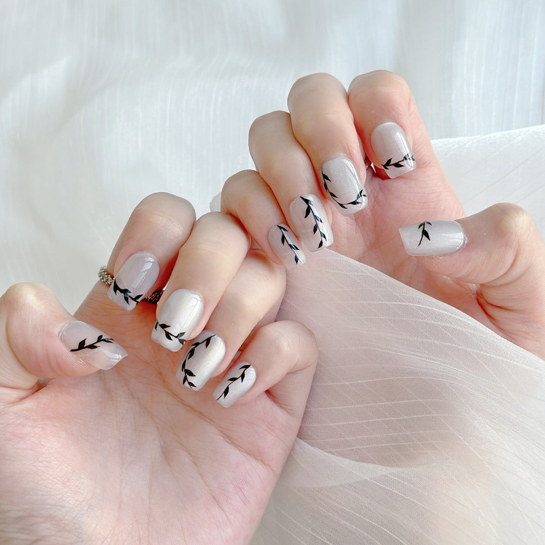 Artistic Press-On Nail Set with Botanical Designs