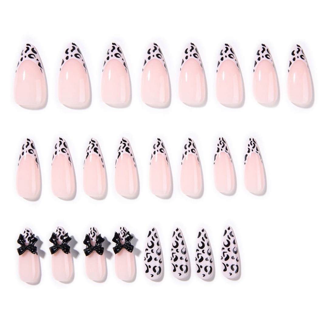 Artful Stiletto Nails with Leopard Print and Bow Accent Kalsten