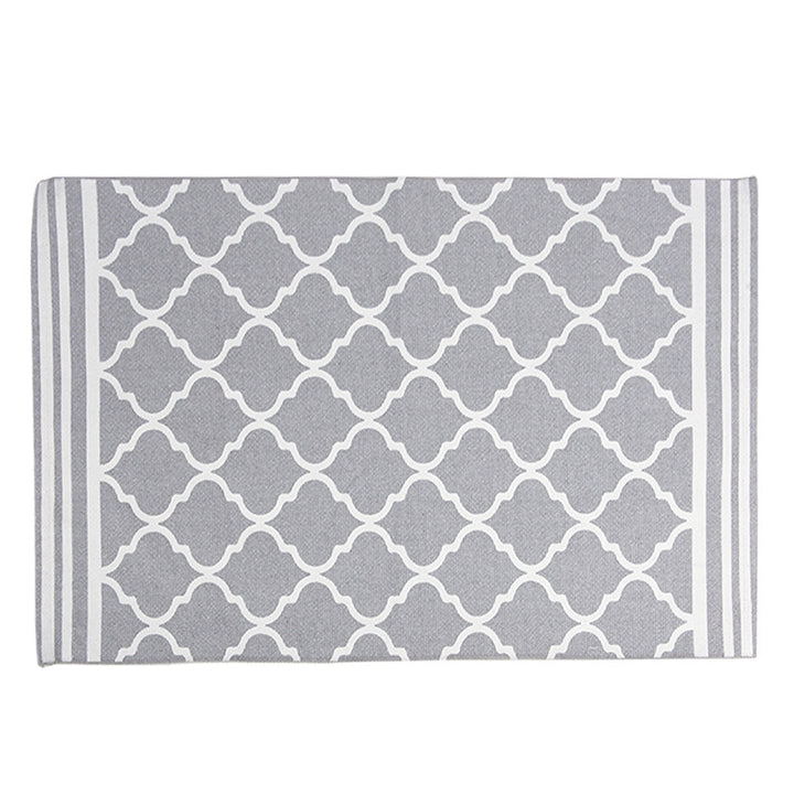 Flat-woven runner rug with diamond pattern and easy-care texture