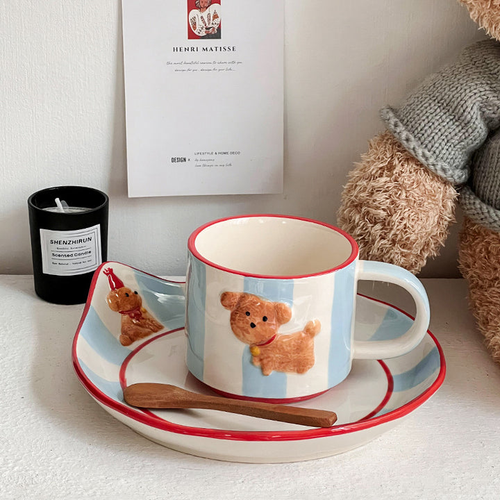 Ceramic cup set with saucer, hand-painted dog motif and wooden spoon