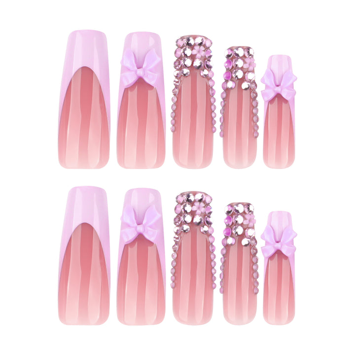 Artful Nail Art with Rhinestone Accents and Bows Kalsten