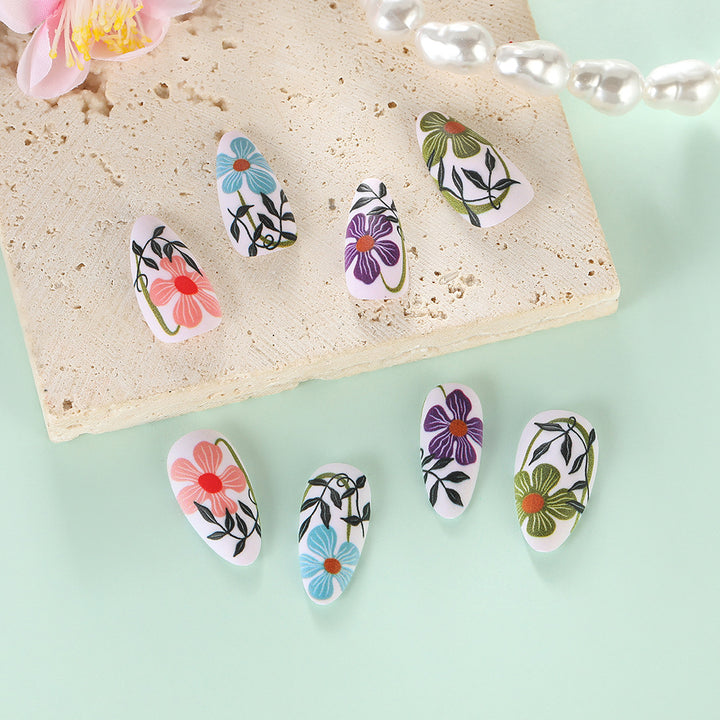 Artificial nails with floral accent Kalsten
