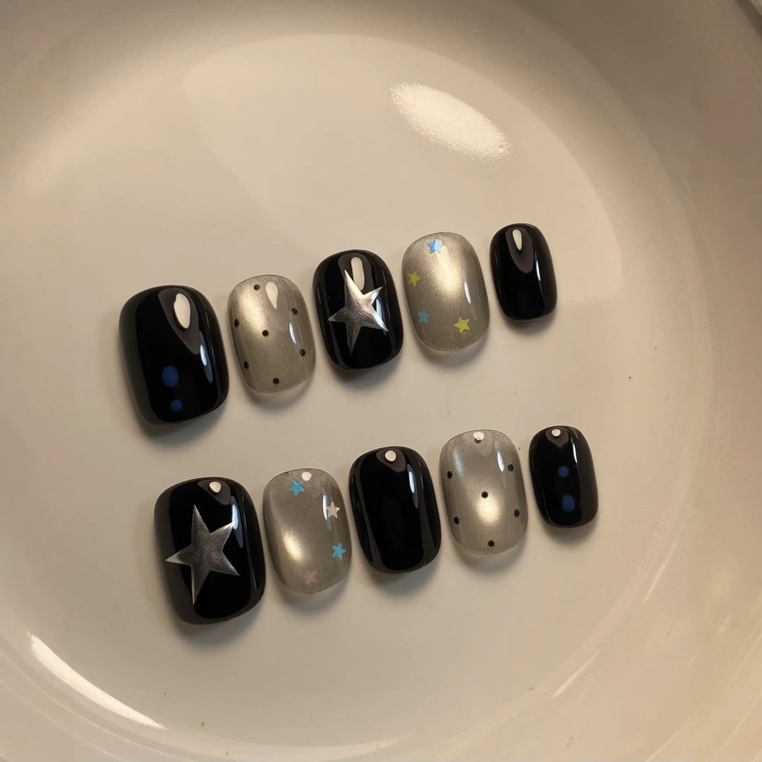 Artistic Press-On Nail Set with Celestial Designs