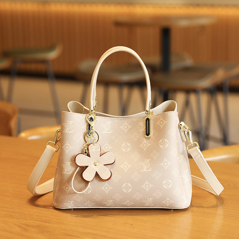 Elegant Handheld Tote Bag with Charming Floral Keychain