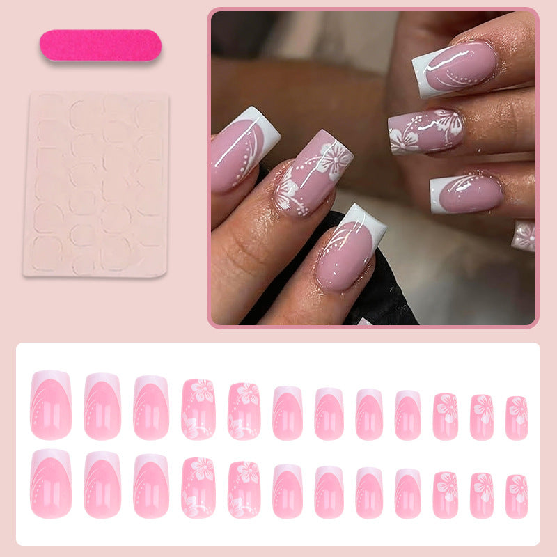 Artificial nail set with elegant French design and delicate flower patterns Kalsten