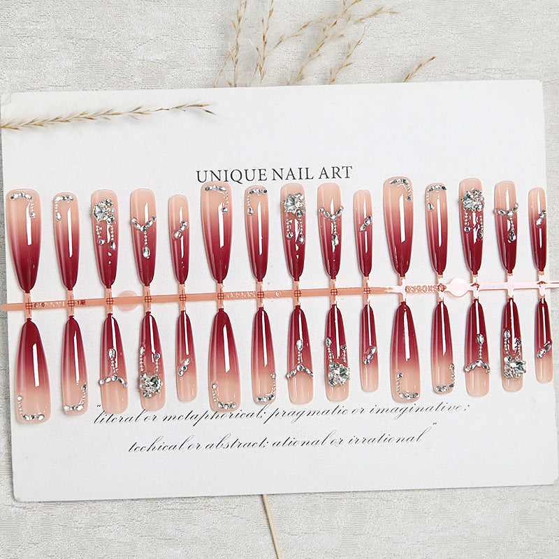 Artificial nails with elegant glitter and jewelry accents Kalsten