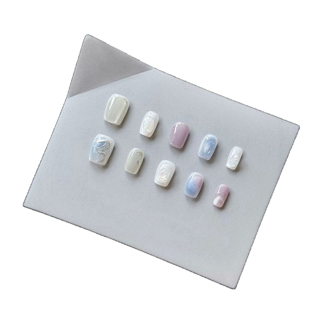 Artistic Press-On Nail Set with Ethereal Marble Effects