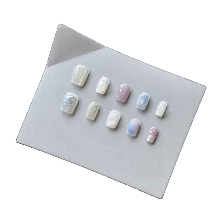 Artistic Press-On Nail Set with Ethereal Marble Effects