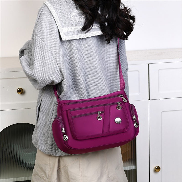 WoMulti-Pocket Crossbody Bag