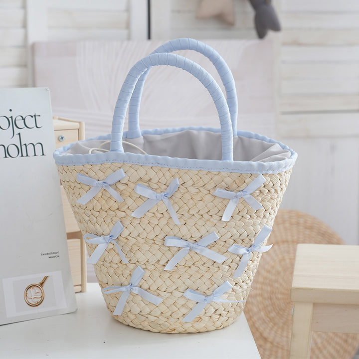 Basket bag with delicate bows and Kalsten lining