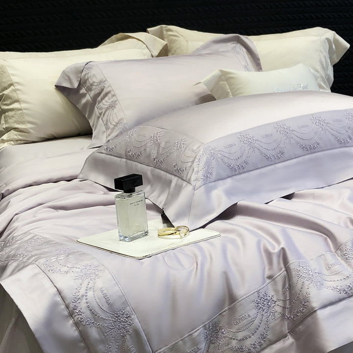 Satin duvet cover and pillowcase set with fine jacquard embroidery and hotel finish