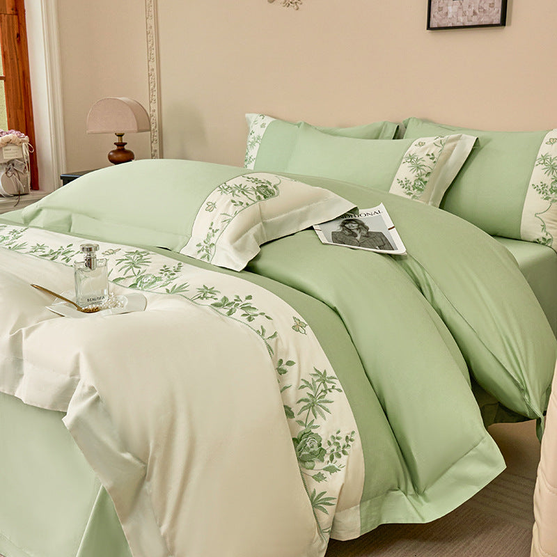 Luxurious bedding set with embroidered border and satin look
