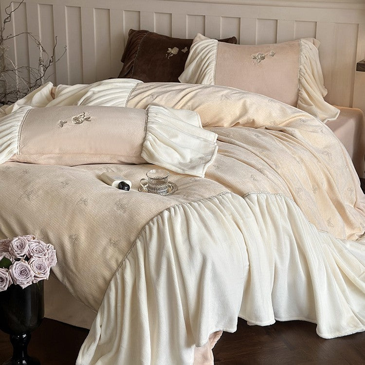 Satin bedding set with gathered ruffles and delicate butterfly embroidery