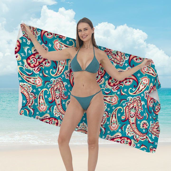 Beach towel with vibrant tropical plant motif Kalsten