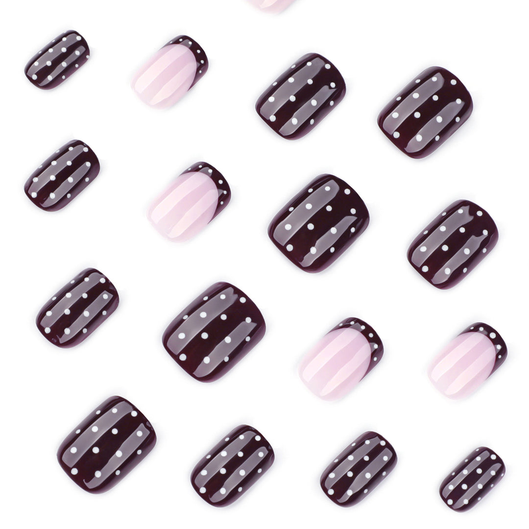 Artful nail art with elegant polka dot design Kalsten