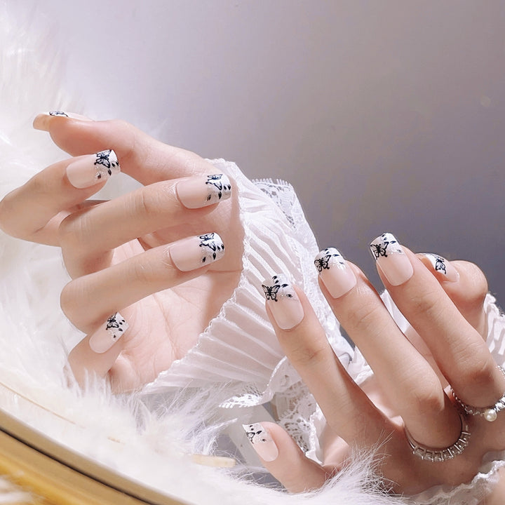 Artistic Press-On Nail Set with Butterfly Designs