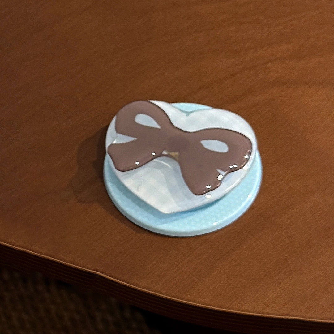 Decorative ceramic coaster with bow motif Kalsten