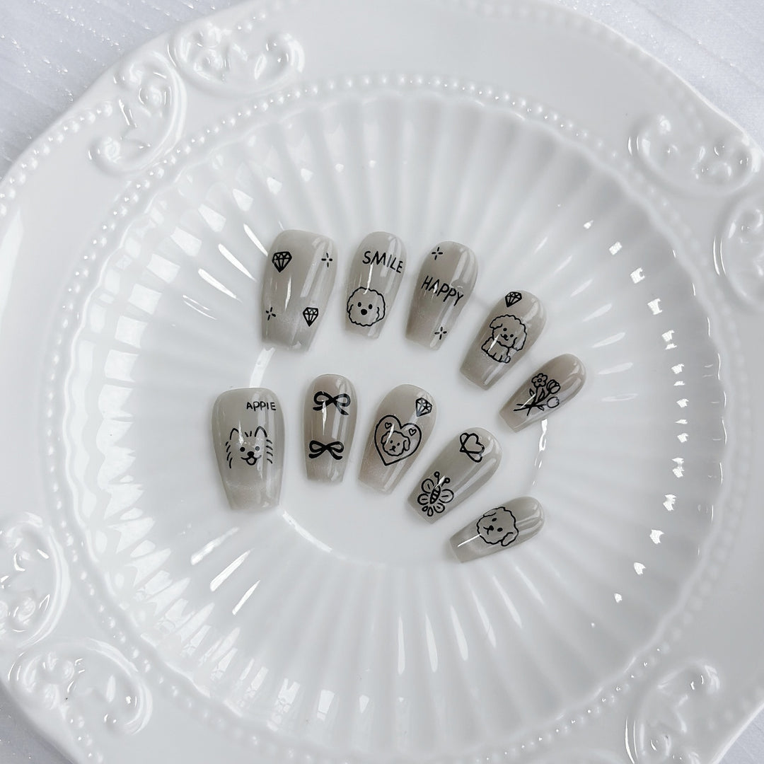 Artistic Press-On Nail Art Set with Heart and Celestial Designs