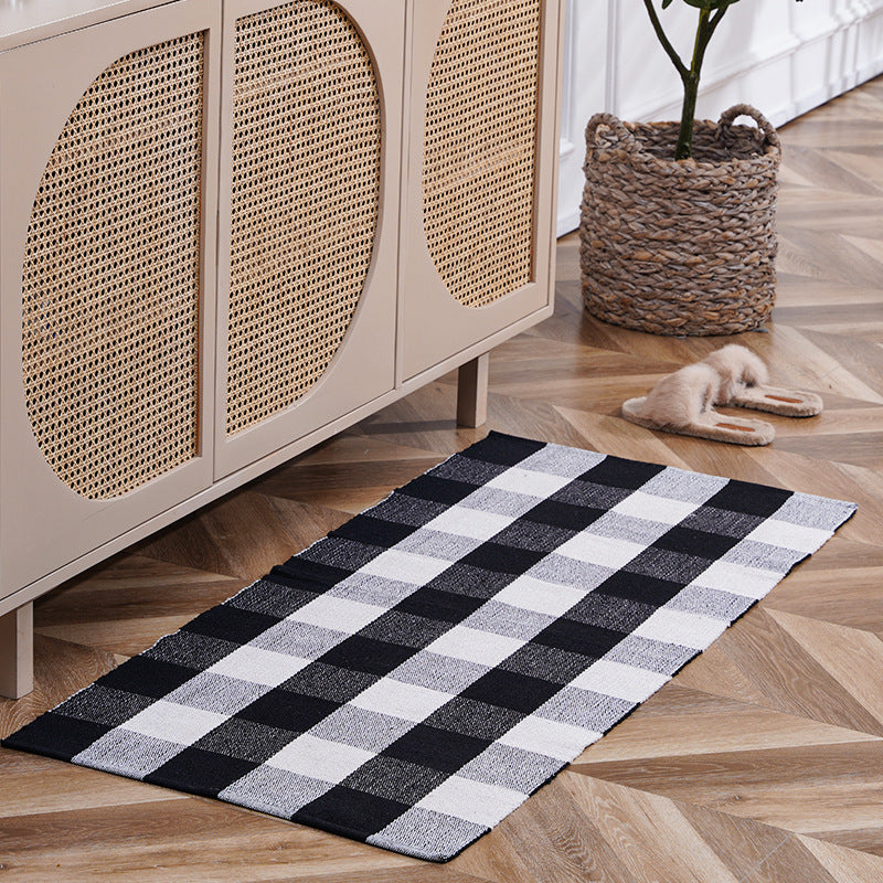 woven living room runner with fringes and geometric weave pattern