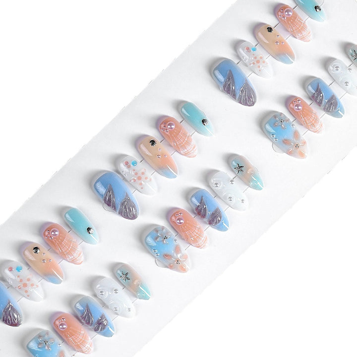 Creative nail art set with delicate floral and maritime designs Kalsten
