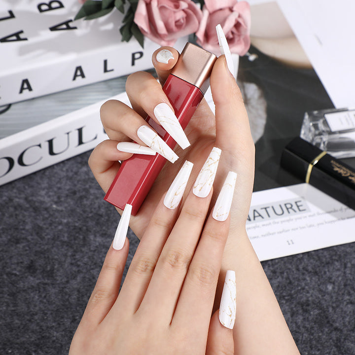 Artificial nails in elegant geometric design Kalsten