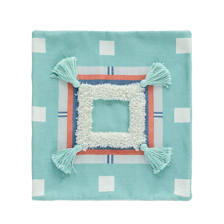Square Boho decorative pillow with crocheted pom-pom and decorative corner tassels