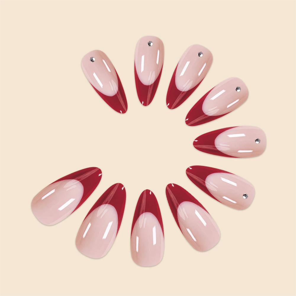Elegant Stiletto Nail Art with Rhinestone Accents
