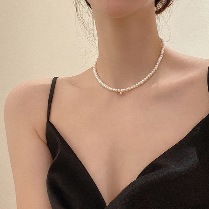 Delicate pearl necklace with elegant gold accent chain Kalsten