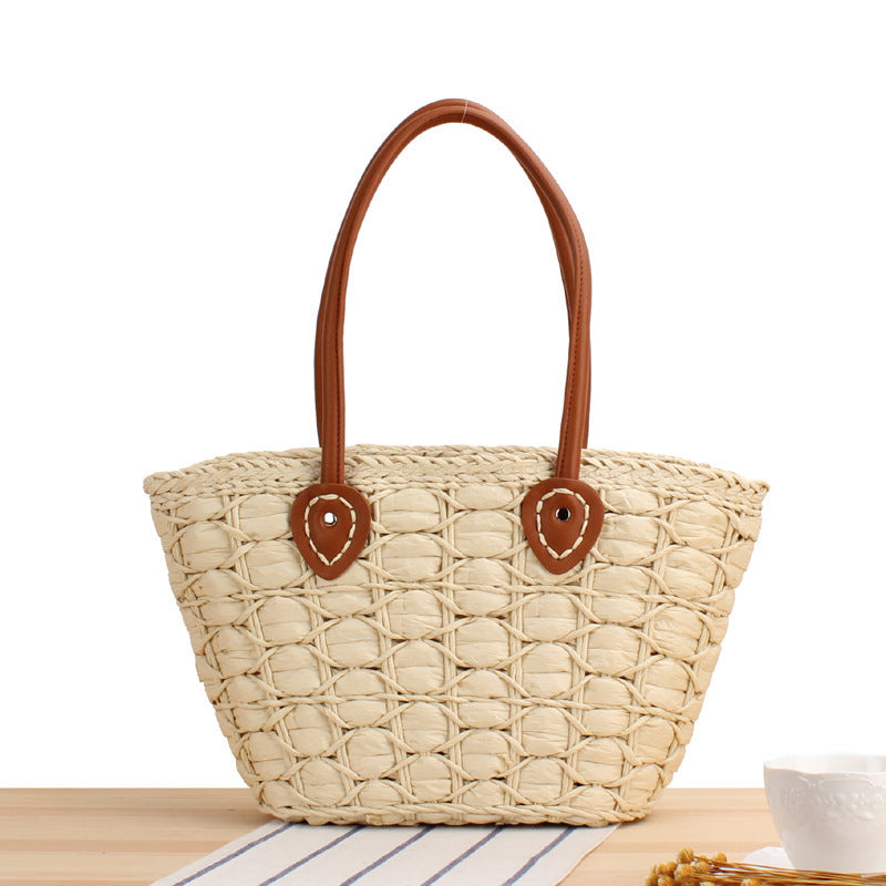Handcrafted wicker bag with elegant leather accents Kalsten