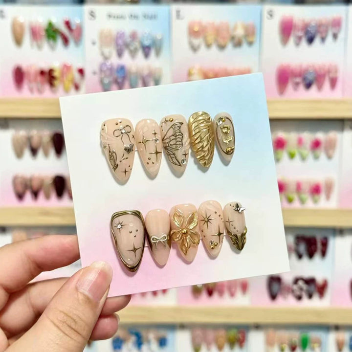 Artistic Press-On Nails Set with Gold and Floral Embellishments