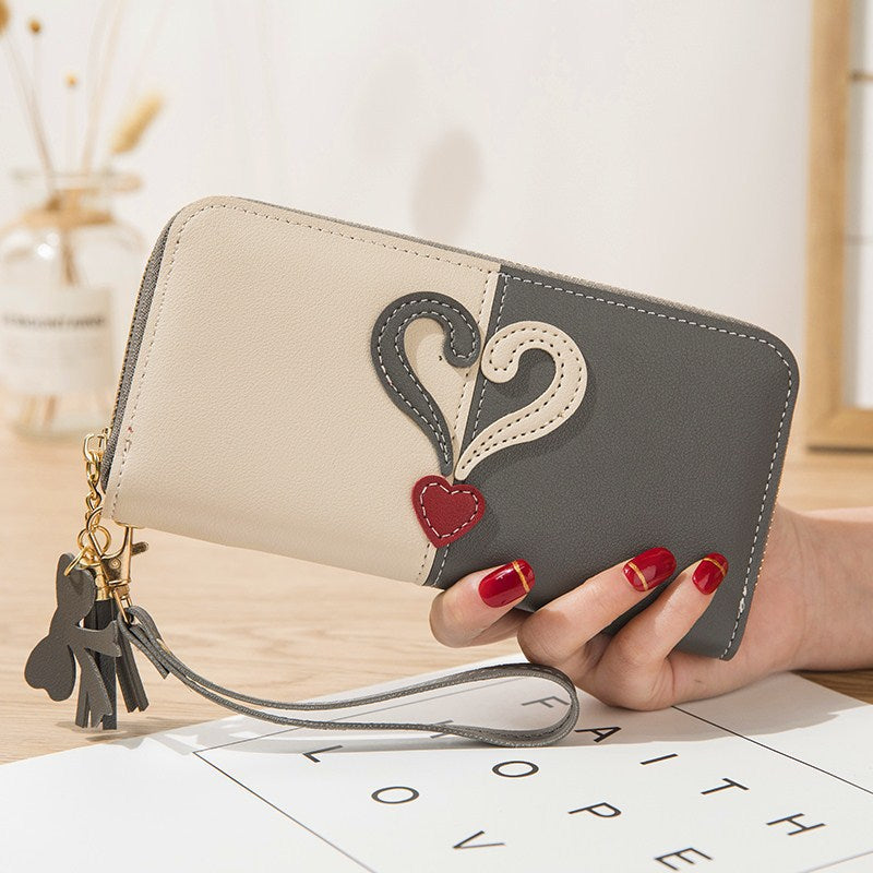 Stylish wallet with heart appliqués Kalsten