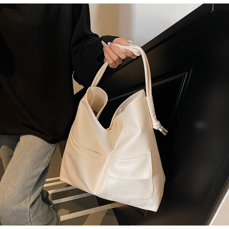 Casual tote bag with practical front pockets Kalsten
