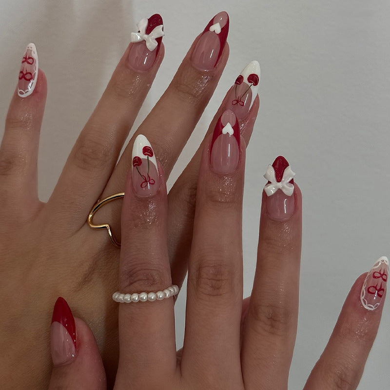 Fake nail set with playful motifs and elegant accents Kalsten