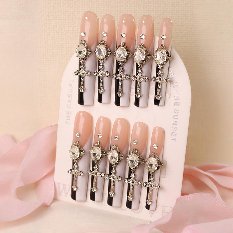 Glamorous artificial nails with elegant cross decorations Kalsten