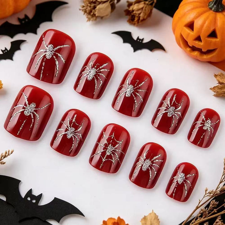 Acrylic nail set with spooky spider and glitter accents Kalsten