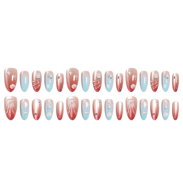 Artificial nails with sparkling rhinestone embellishments and maritime design Kalsten