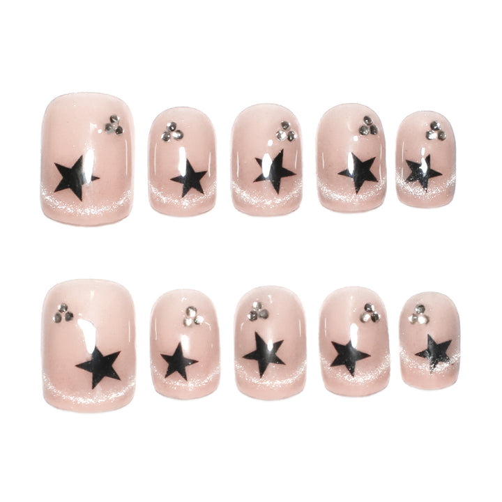 Artistic acrylic nails with glamorous star motifs Kalsten