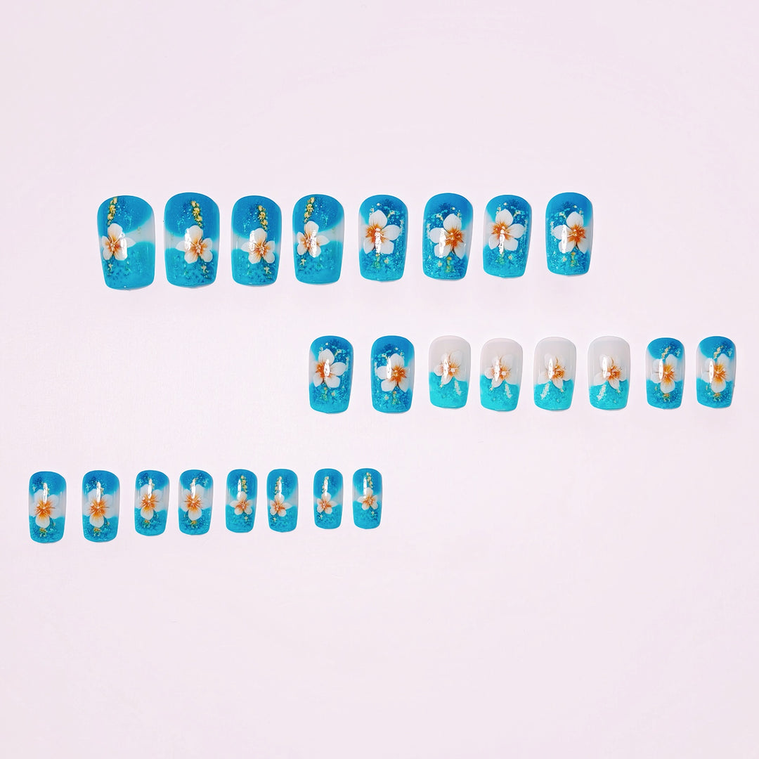 Artificial nails with floral accents and glitter patterns Kalsten