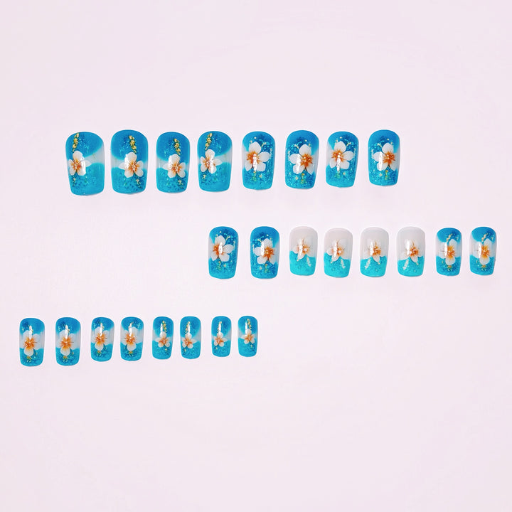 Artificial nails with floral accents and glitter patterns Kalsten
