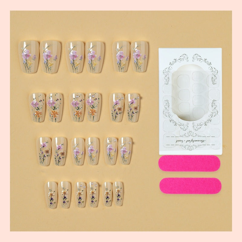 Artificial nail set with floral embellishments and glamorous details Kalsten