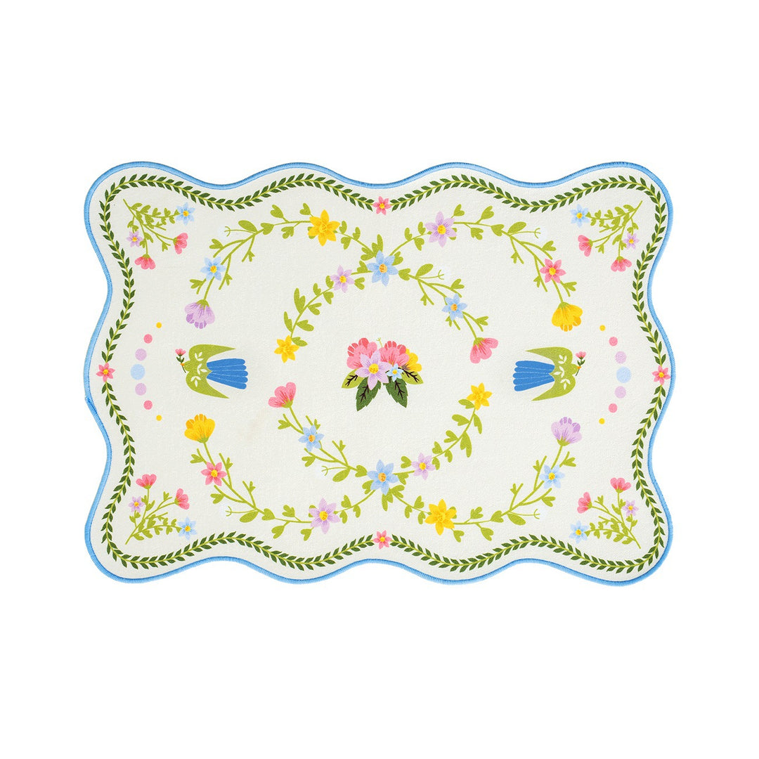Shaped placemat made of cotton blend with pomegranate and parrot motif