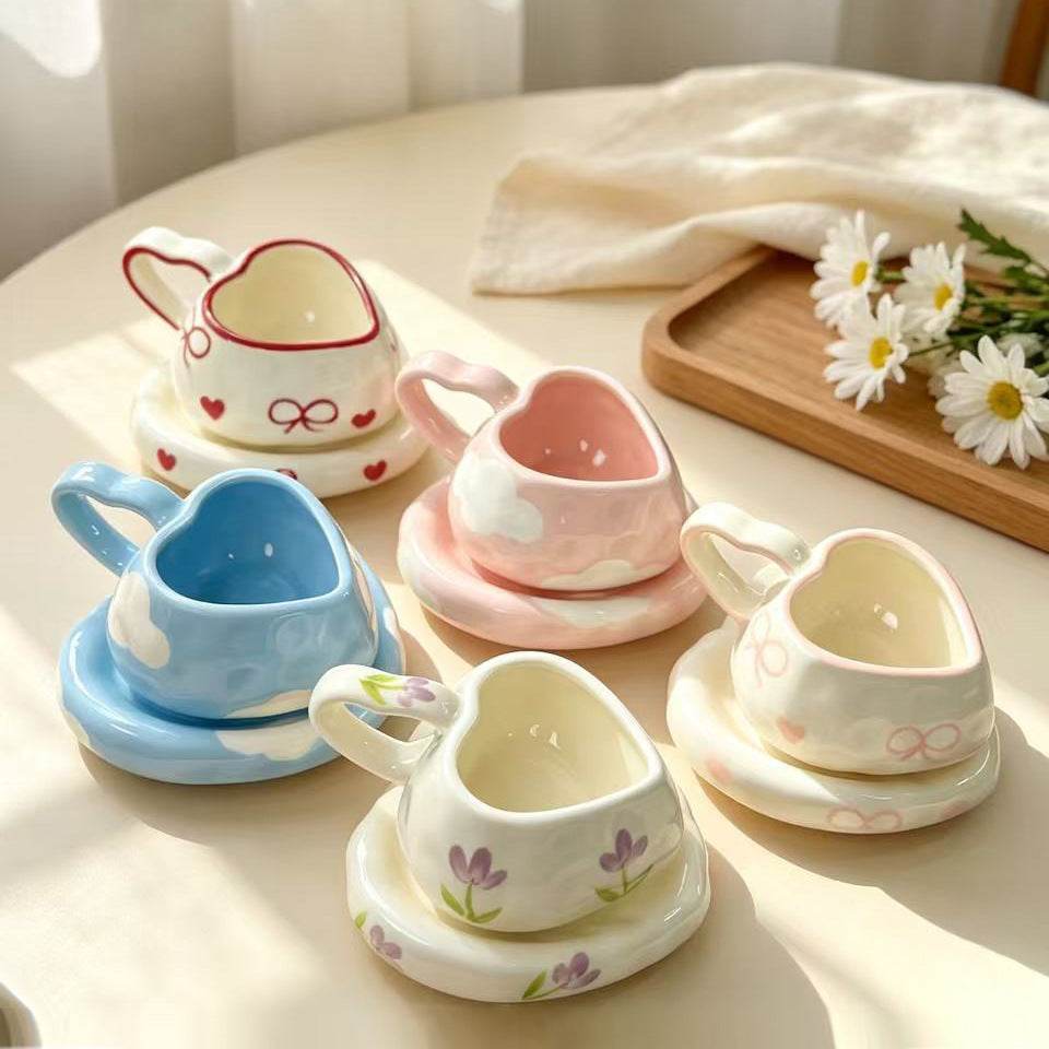 Heart-shaped ceramic cup set with saucer