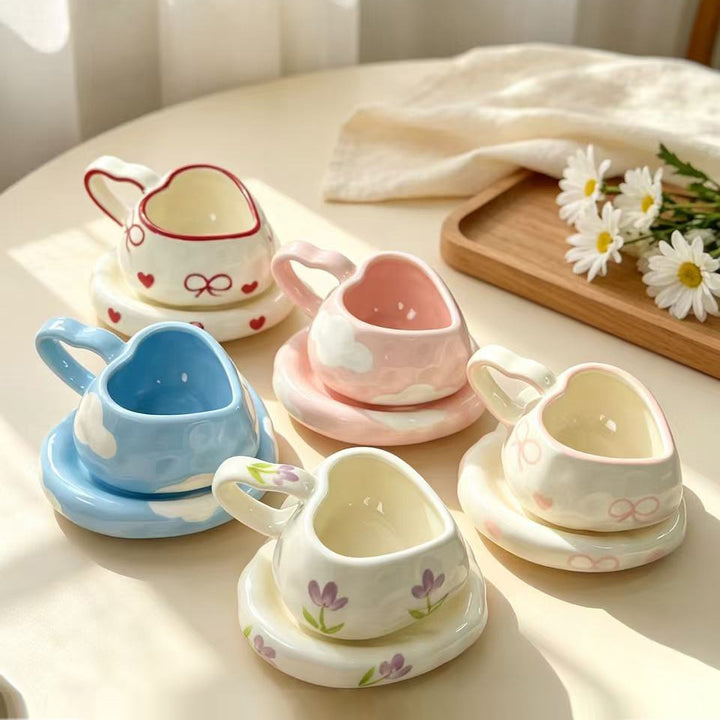 Heart-shaped ceramic cup set with saucer