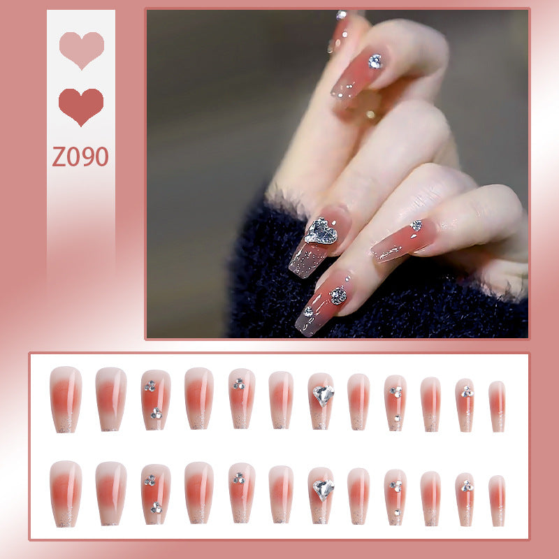 Acrylic nail set with elegant heart and rhinestone decorations Kalsten