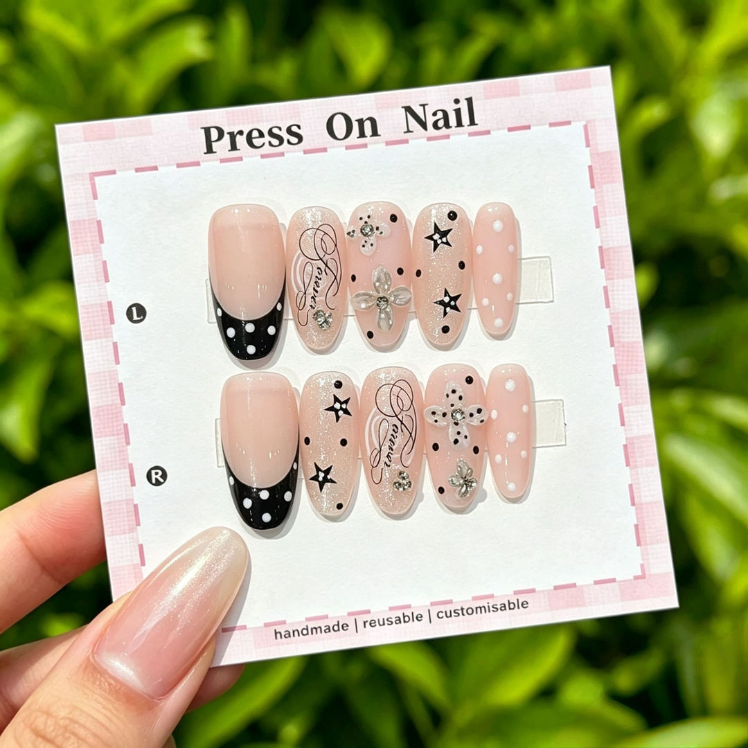 Artistic Press-On Nail Set with Star and Floral Accents