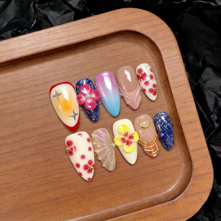 Artistic Press-On Nail Set with Floral and Decorative Accents