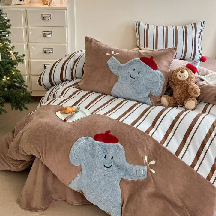 Quilted bedding and throw blanket set with check stitching, velvet texture, and floral appliqué