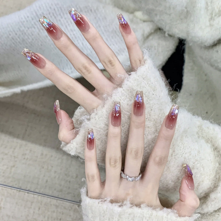 Glamorous artificial nails with glitter effects Kalsten