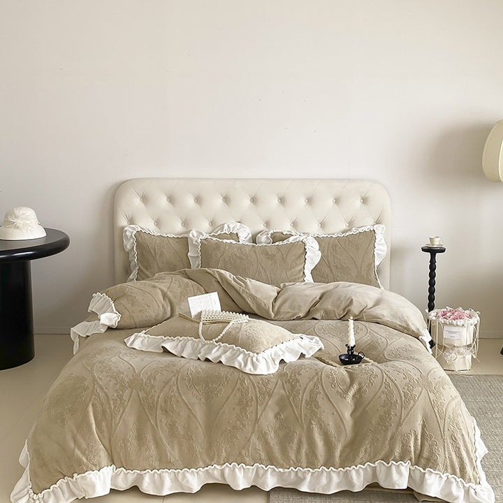 Bedding set with quilted jacquard relief and decorative ruffle