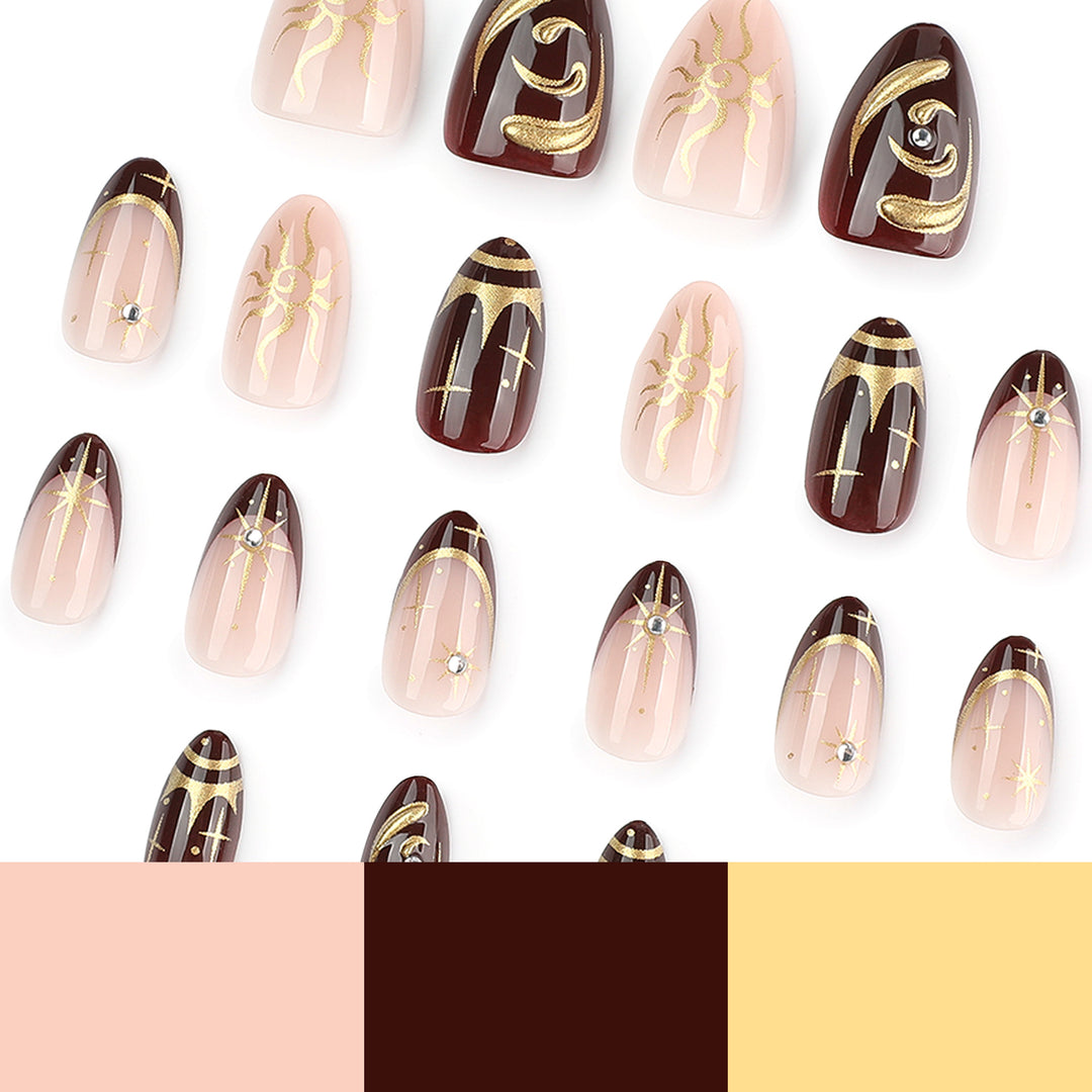 Artful nail art with golden accents and mystical motifs Kalsten